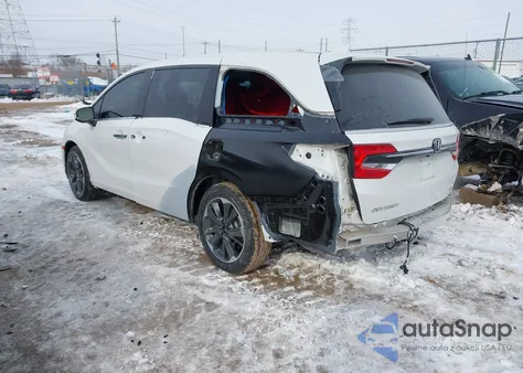 2023 Honda Odyssey Elite z USA, uszkodzony, nr VIN 5FNRL6H96PB013755